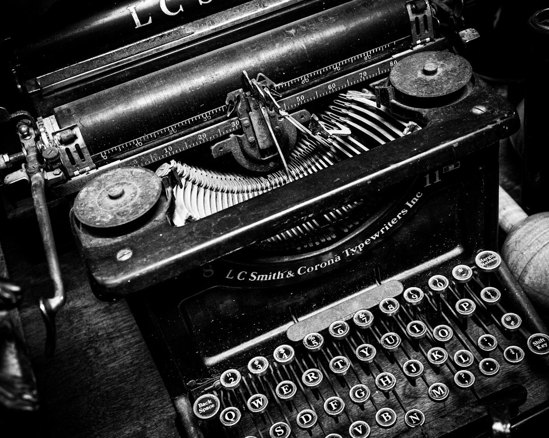Vintage typewriter with a sheet of paper